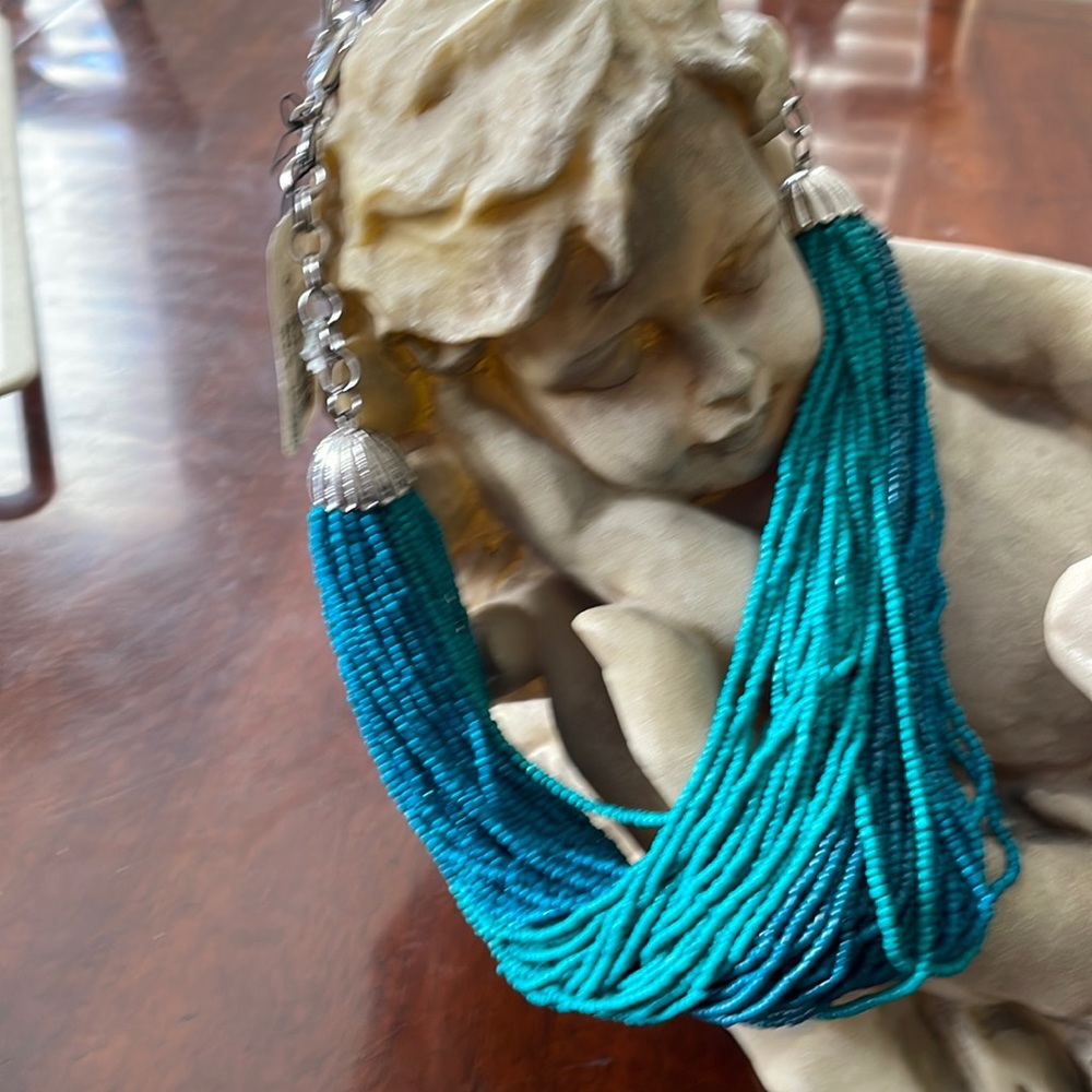 One Wink turquoise choker with silver chain.